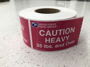 アメリカ郵便局　配達ボックス用　CAUTION HEAVYステッカー（注意・重量があります）ロール　500枚　アメリカ　USA 雑貨　危険表示 サイン