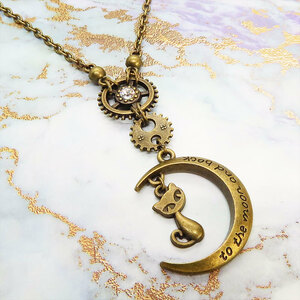  steam punk manner antique color ( gold old beautiful color ). cat . three day month . tooth car necklace Swarovski 