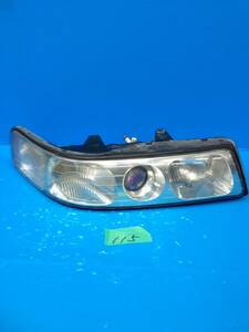  Cadillac Seville head light right 16524878 No115