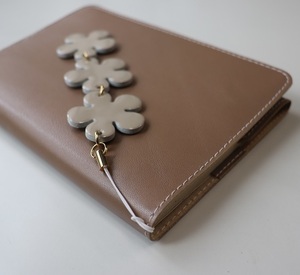  leather. library cover * oak color * sheep leather *A6 cover *A6 pocketbook cover * leather. . flower. three ream charm attaching *..-. atelier * hand made 