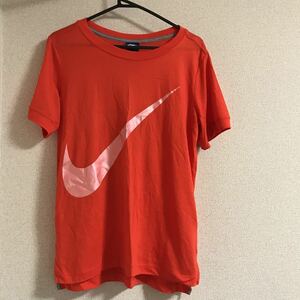 NIKE ナイキ　ウィメンズ　Mサイズ　半袖Tシャツ トップス ナイキ　オレンジ　レディース　中古