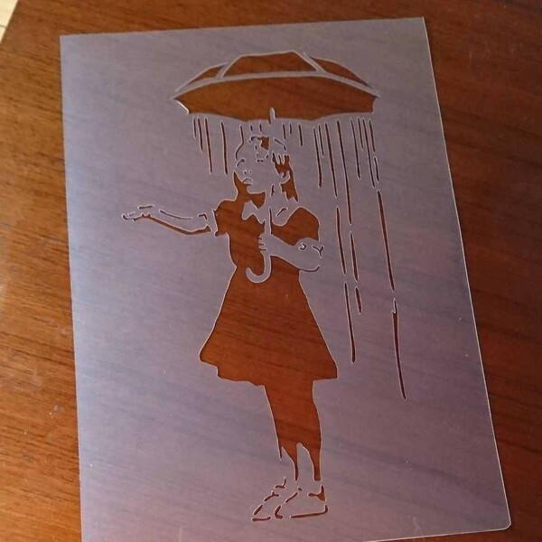 ステンシル　バンクシー　傘少女