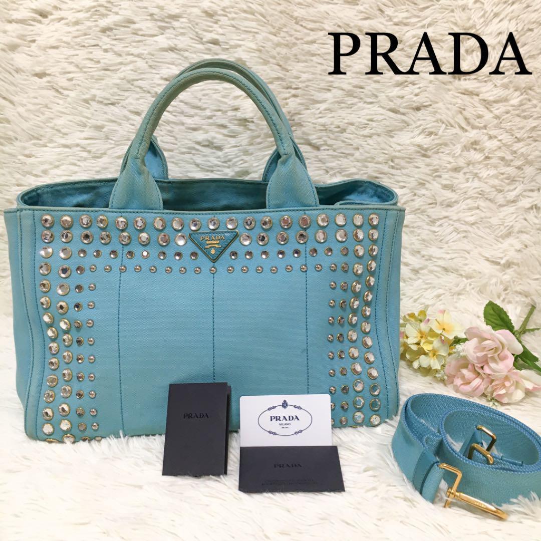 最先端 白タグ Mサイズ 2way 限定品 カナパ 美品PRADA 三角プレート ...