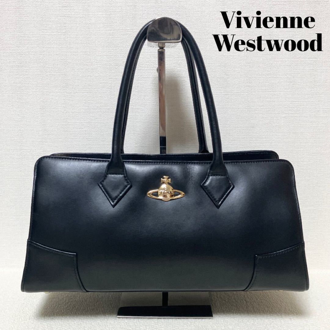 【送料無料】Vivienne Westwood ヴィヴィアンウエストウッド ハンドバッグ 巾着 クリーム 白 レディース オーブ 型押し