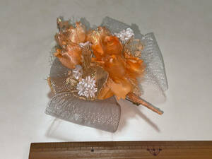 * for lady [.* party etc. / corsage / bouquet ( orange )]*