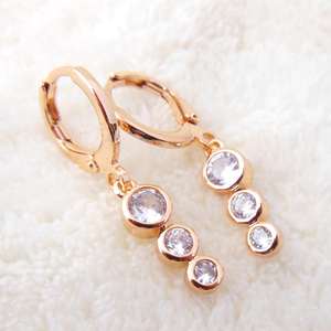 14 gold pink gold Phil docz diamond design earrings OM