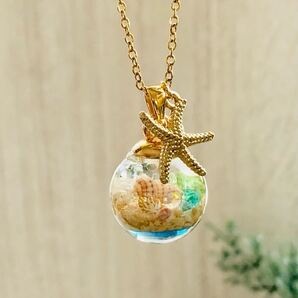 海シリーズ 沖縄産星砂と貝殻のネックレス18㎜ガラス【サージカルステンレス】