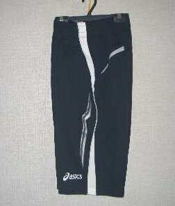 XS7008 Asics warm-up shorts black × light silver O new goods '