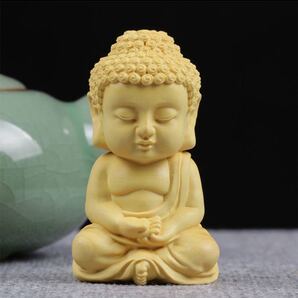 仏教美術柘植 超可愛い釋迦摩尼仏 枕本尊 仏具 仏像 置物 お守り 縁起物 高さ7cm 黄楊木 工芸品