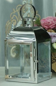  candle holder lantern manner fine clothes .. metallic color made of stainless steel ( silver )