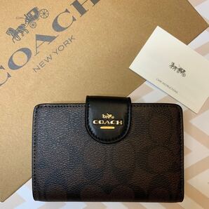 COACH コーチ アウトレット ブラウンブラック シグネチャー 折財布 新品