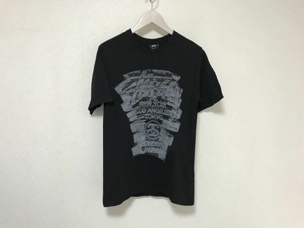 本物ステューシーSTUSSYコットンロゴプリント半袖Tシャツストリートアメカジサーフミリタリーメンズ黒ブラックSメキシコ製