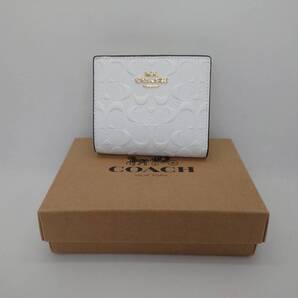送料無料 新品 COACH 二つ折り財布 FC7353 シグネチャー アウトレット品