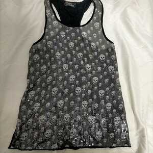  not yet have on black spangled Skull tank top 