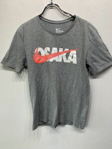 NIKE/ナイキ　OSAKA　Tシャツ　 灰/グレー 　メンズＭ　ビッグロゴ　THE　NIKE　TEE　スポーツ　K1980
