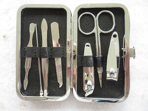  nail clippers set travel . off . chair. drawer .1 piece exist . safety thing . soup ..... do . man woman. person .