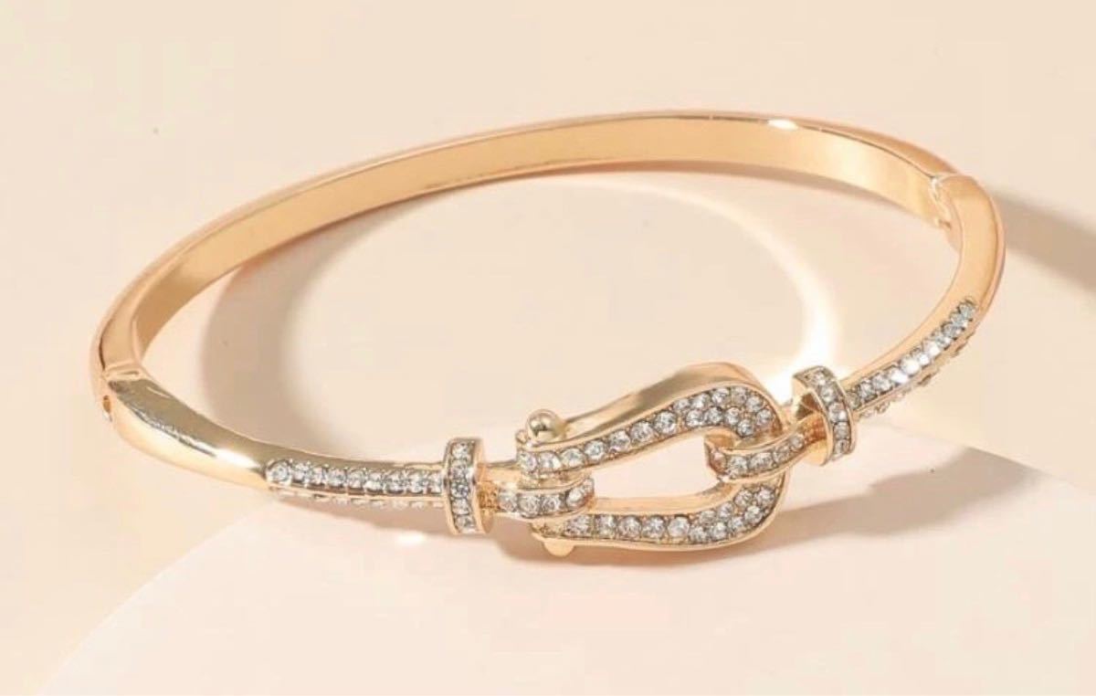 Gucci YA147507 ゴールド リザードレザー Gフレーム カットガラス