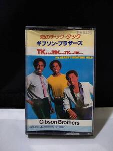 T3220　カセットテープ　GIBSON BROTHERS　ギブソン・ブラザーズ / 恋のチック・タック TIC...TOC...TIC...TAC...　日本国内版