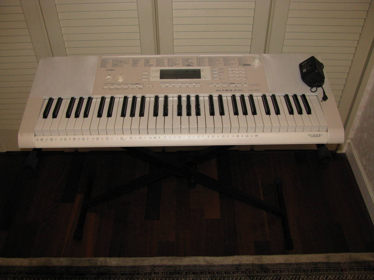 信頼 中古 キーボード Casio Lk 128 61ピアノ形状鍵盤 光ナビゲーション 簡易動作確認済 箱無 電子ピアノ