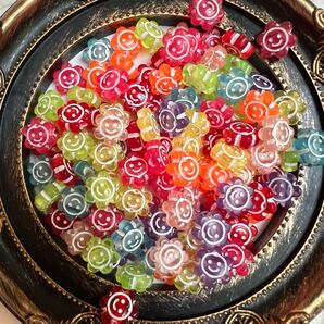 182ニコニコフラワーアクリルビーズ50g