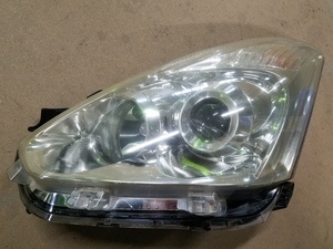  Wish ZNE14G ZNE11G ZNE10G latter term original head light left side headlamp he drain zICHIKOH 68-12 Toyota ZNE10 [Y/03-0018]