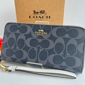 1円スタート【新品未使用】コーチCOACH長財布 シグネチャー C4452 ラウンドファスナー ストラップ付き ライトブルー