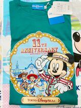 新品 未使用 ディズニー TDS 11周年 ピクサー トイ・ストーリーマニア トイマニ ミッキー ウッディ ジェシー ピクサー Tシャツ サイズ140_画像2