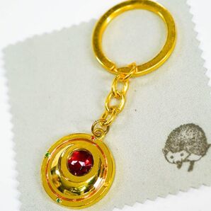 キーホルダー セーラームーン 変身ブローチ ストラップ 金 円 グッズ アクセサリー おもちゃ