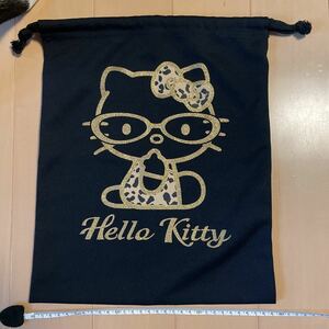 送料込み　キティちゃんの巾着袋　メガネ　金色　ハローキティ　KITTY 黒ブラック　送料無料