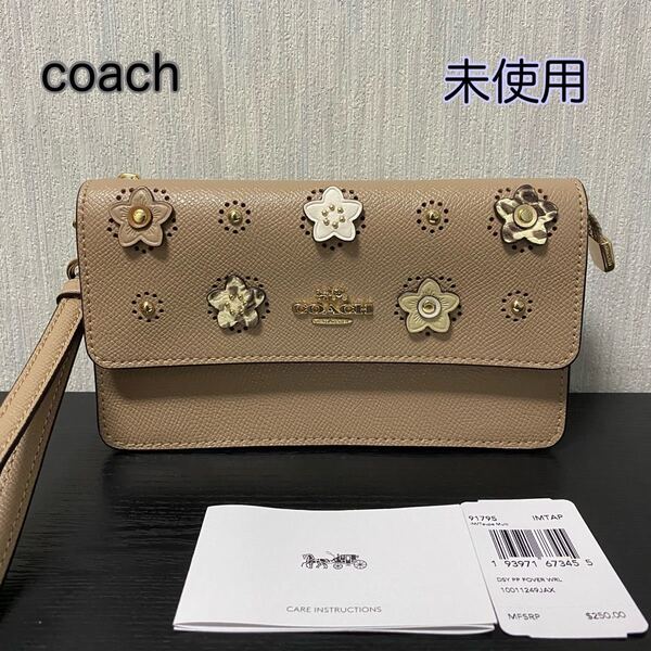 未使用☆coach フラワーモチーフ クラッチバッグ