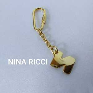 **NINA RICCI key holder charm Gold color 