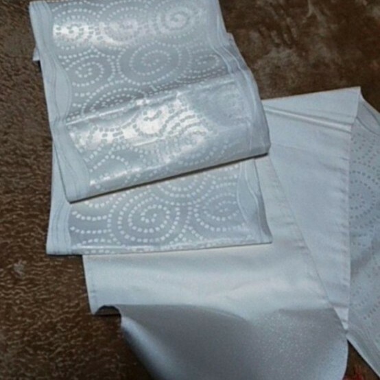 白地にプラチナ刺繍の珍しい正絹袋帯です