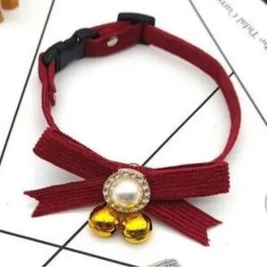 赤いリボンと白いモフモフザビエル首輪セットです!