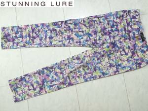 美品STUNNING LURE（スタニングルアー）紫×ピンク×白×黄緑　ストレッチパンツ　36　　　　　S相当