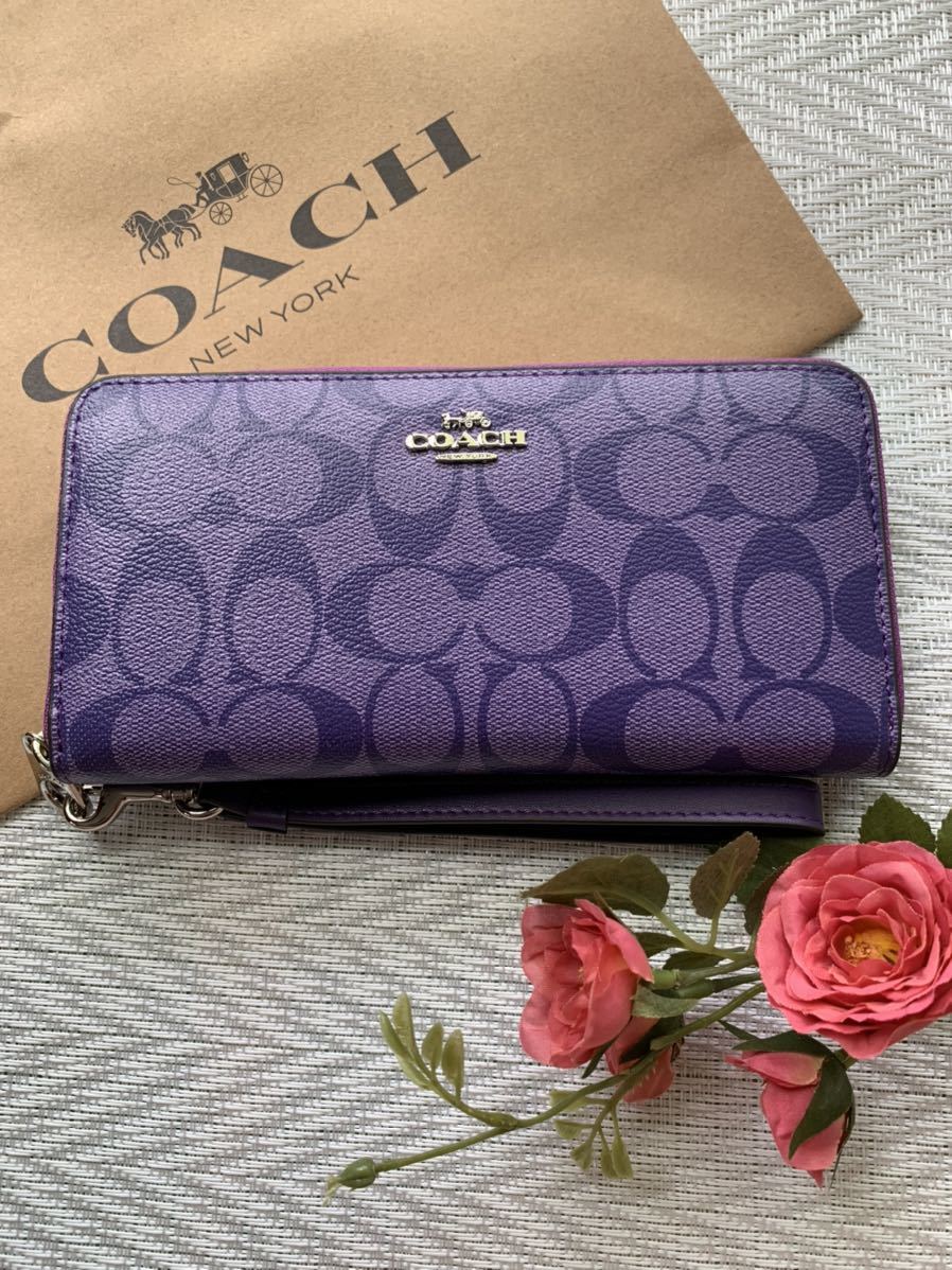 COACH スポーツパープル シグネチャー ロングジップ ウォレット アラウンド