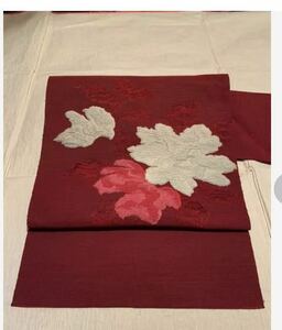 名古屋帯 正絹紬織地 名古屋仕立てお太鼓柄 エンジの紬織生地に花柄 N017