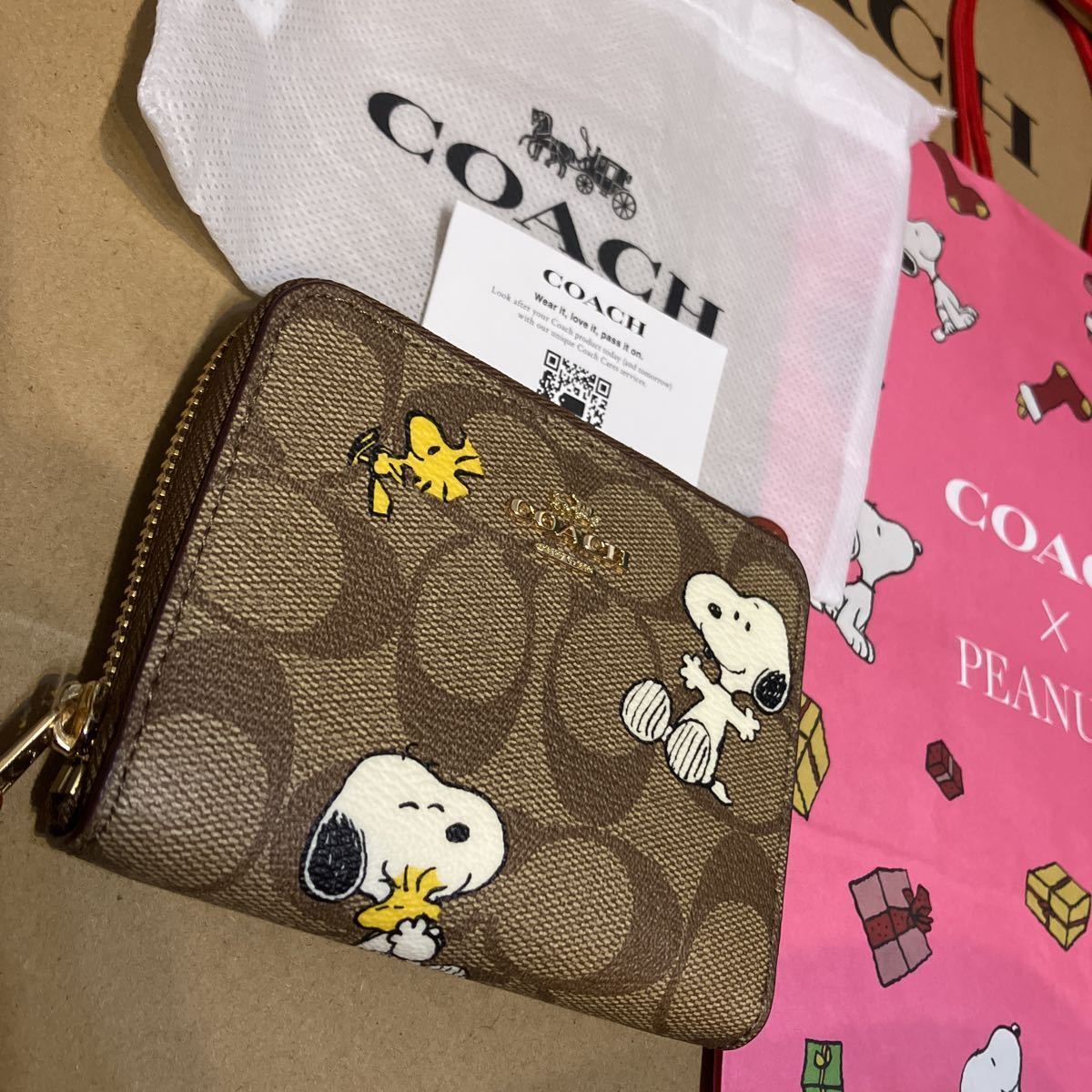 新品未使用 Coachコーチx PEANUTS スヌーピーシグネチャーフーディー