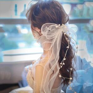 ウェディング ^ ヘッドドレス　結婚式　ヘアアクセサリー　ブライダル　リボン