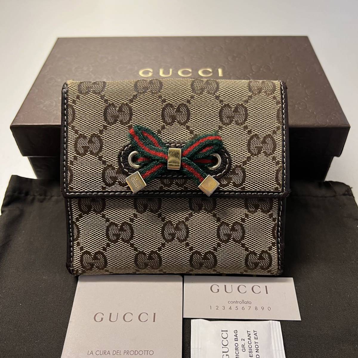 gucci GGキャンバス 折り財布の値段と価格推移は?|390件の売買情報を ...