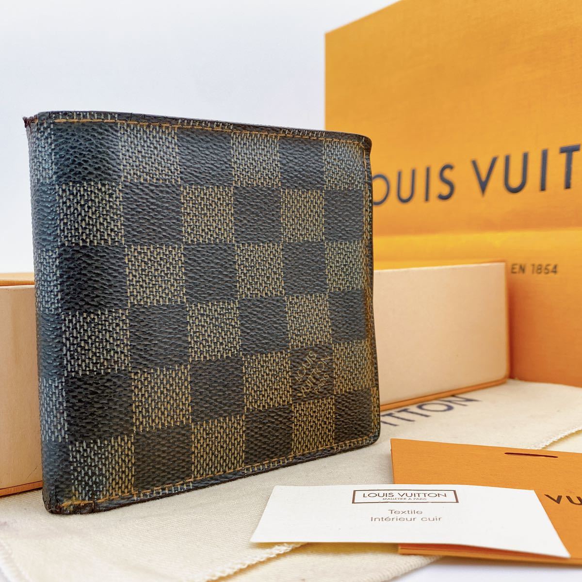 ルイ・ヴィトン 財布 二つ折り ダミエの値段と価格推移は?|1,079件の ...