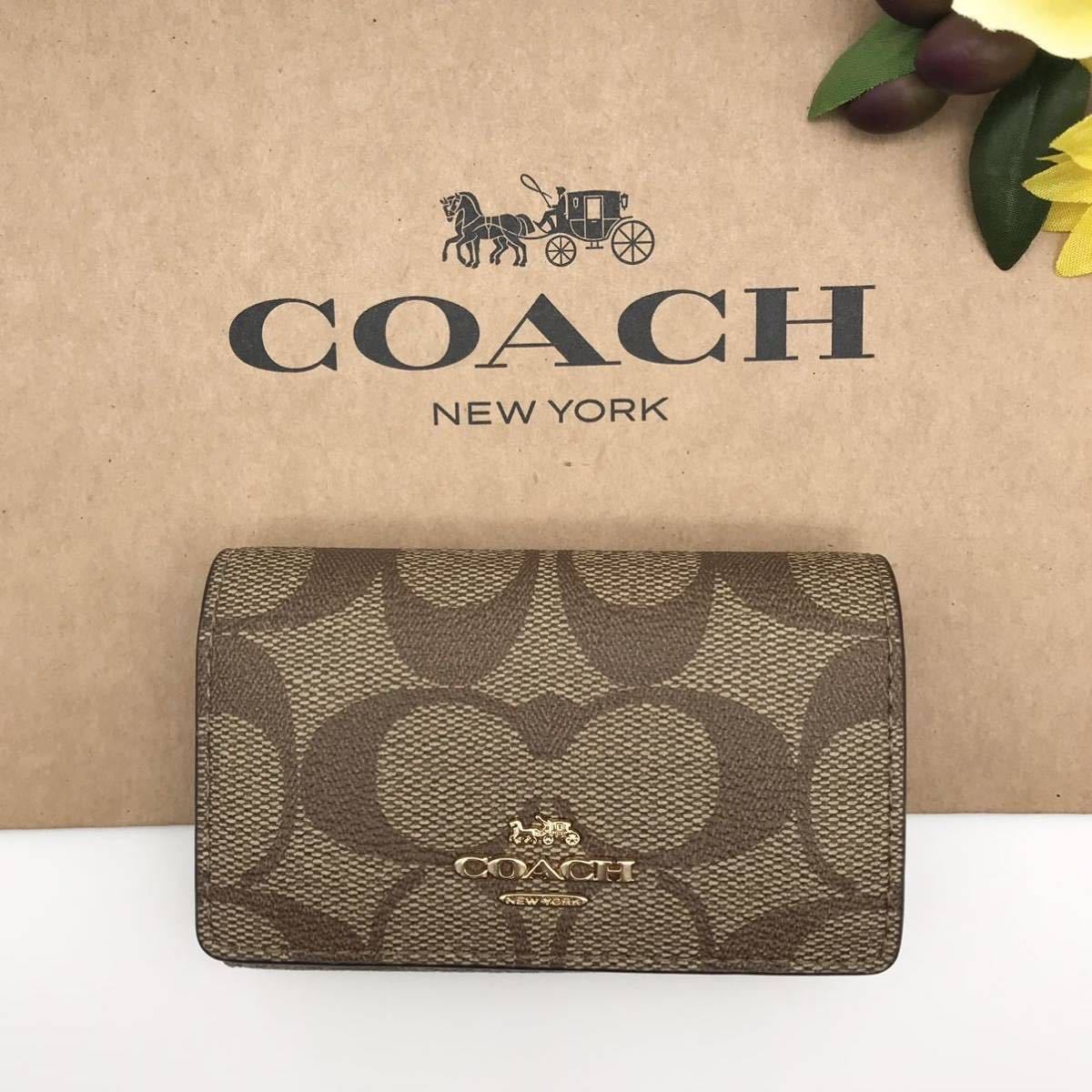 COACH CC142カーキ／アイボリー マルチシグネチャー キャンバス バッグ