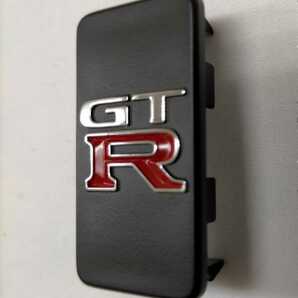 BCNR33 GTR 日産純正 R33 スカイライン GT-R メクラ キャップ コンソール エンブレム 新品1個 在庫納期確認必要 無い場合,落札者都合の削除