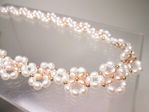 * furthermore beautiful .SILVER fresh water pearl pink . two color. . flower design. necklace also case attaching 