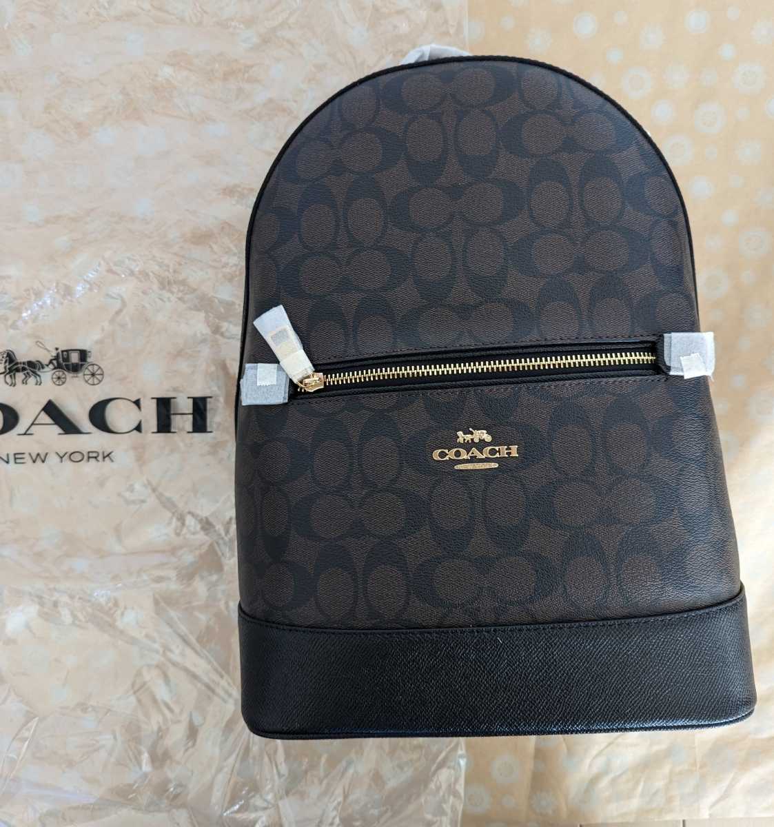 迅速な対応で商品をお届け致します コーチ シグネチャー リュック