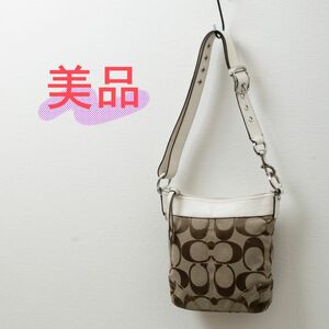 【美品】COACH(コーチ)シグネチャー ダッフル ショルダーバッグ ホワイト×ベージュ F10402 2way レディース 中古