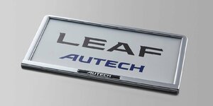 リーフ LEAF ZE1：純正 AUTECH ナンバープレートリム(AUTECHエンブレム付)(フロント リヤ)