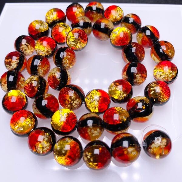 ケラマサンセット 蓄光 ホタルガラス 10mm 連売り とんぼ玉 とんぼガラス 40粒