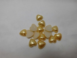 * pearl Stone ( Heart ) orange. like yellow color. like 