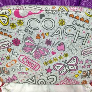 COACH ポピーバタフライノートPCケース 蝶々 花 ハート 星