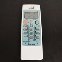 中古品★ MITSUBISHI エアコン用リモコン　NP101 034EL_画像1